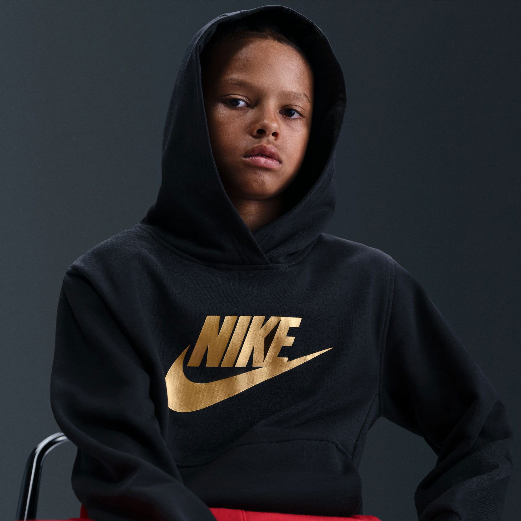 black nike hoodie with gold swoosh