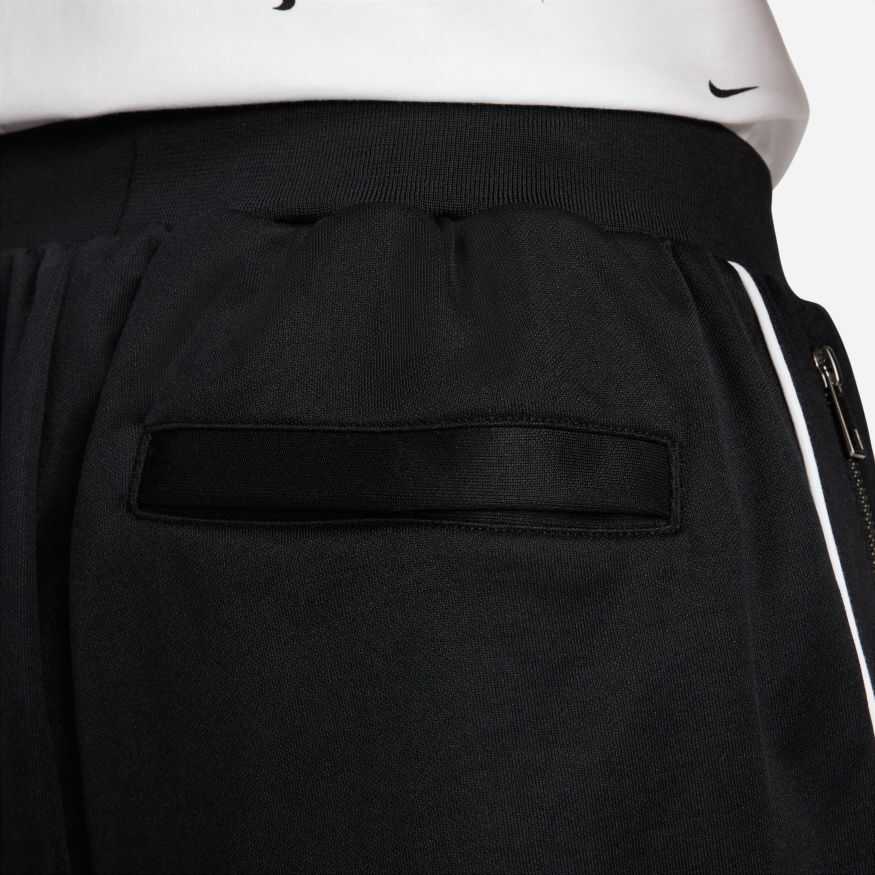 Nike stripe track pants best sale